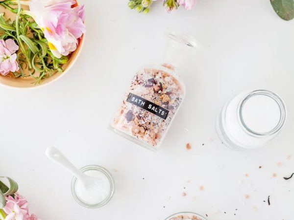 Skincare products on a warm marble surface